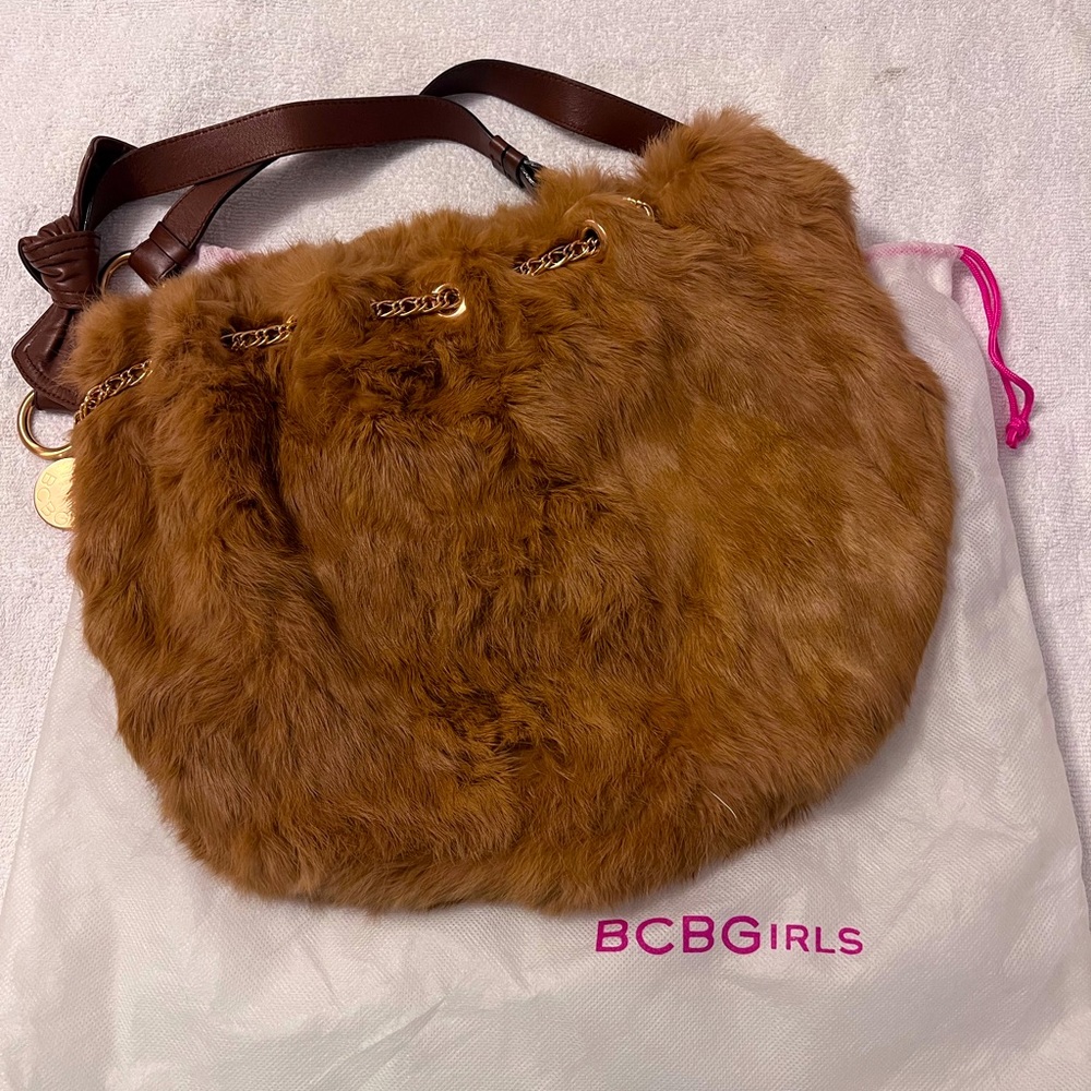 BCBGirls faux fur purse, cinch with chain and leather handles